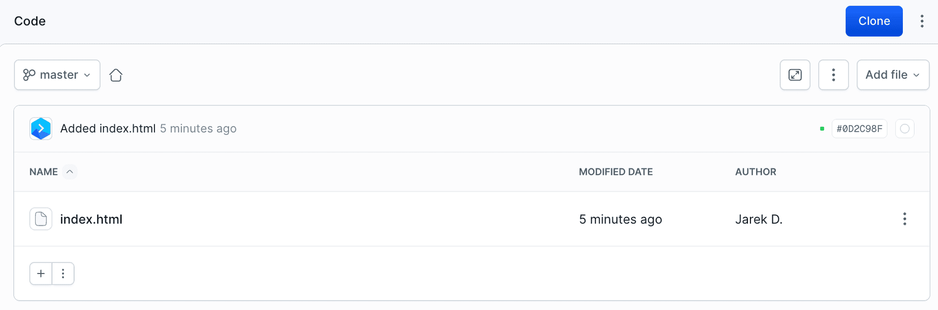 The Code tab showing the pushed index.html and the latest commit